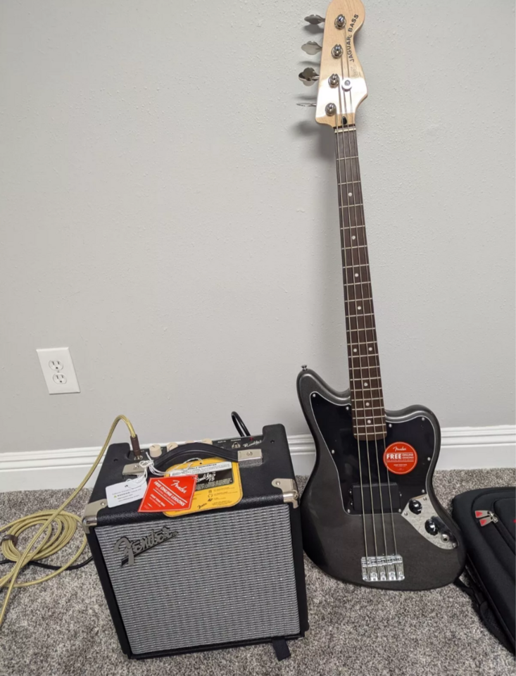 Brand new electric fender bass and amp