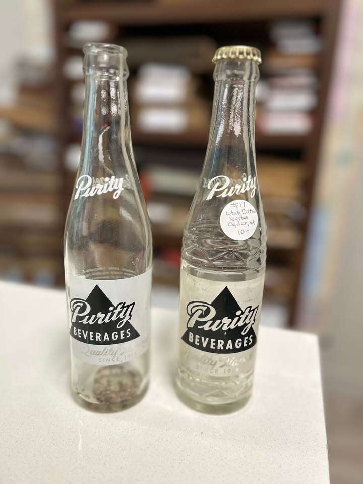 2 Purity Beverages bottles with no chips or breaks