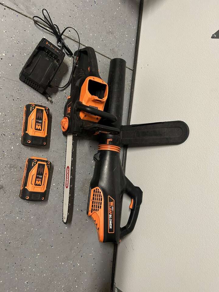 battery powered chainsaw and weed blower