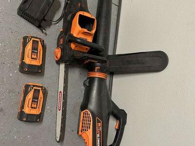 battery powered chainsaw and weed blower