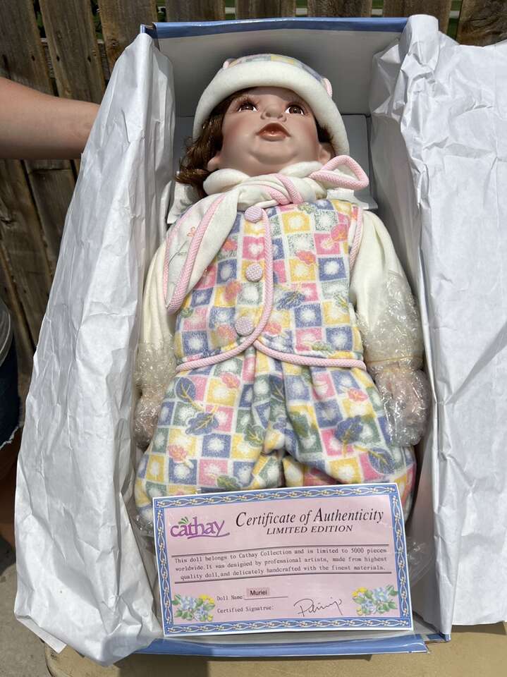 Porcelain Baby Doll (never been played with)