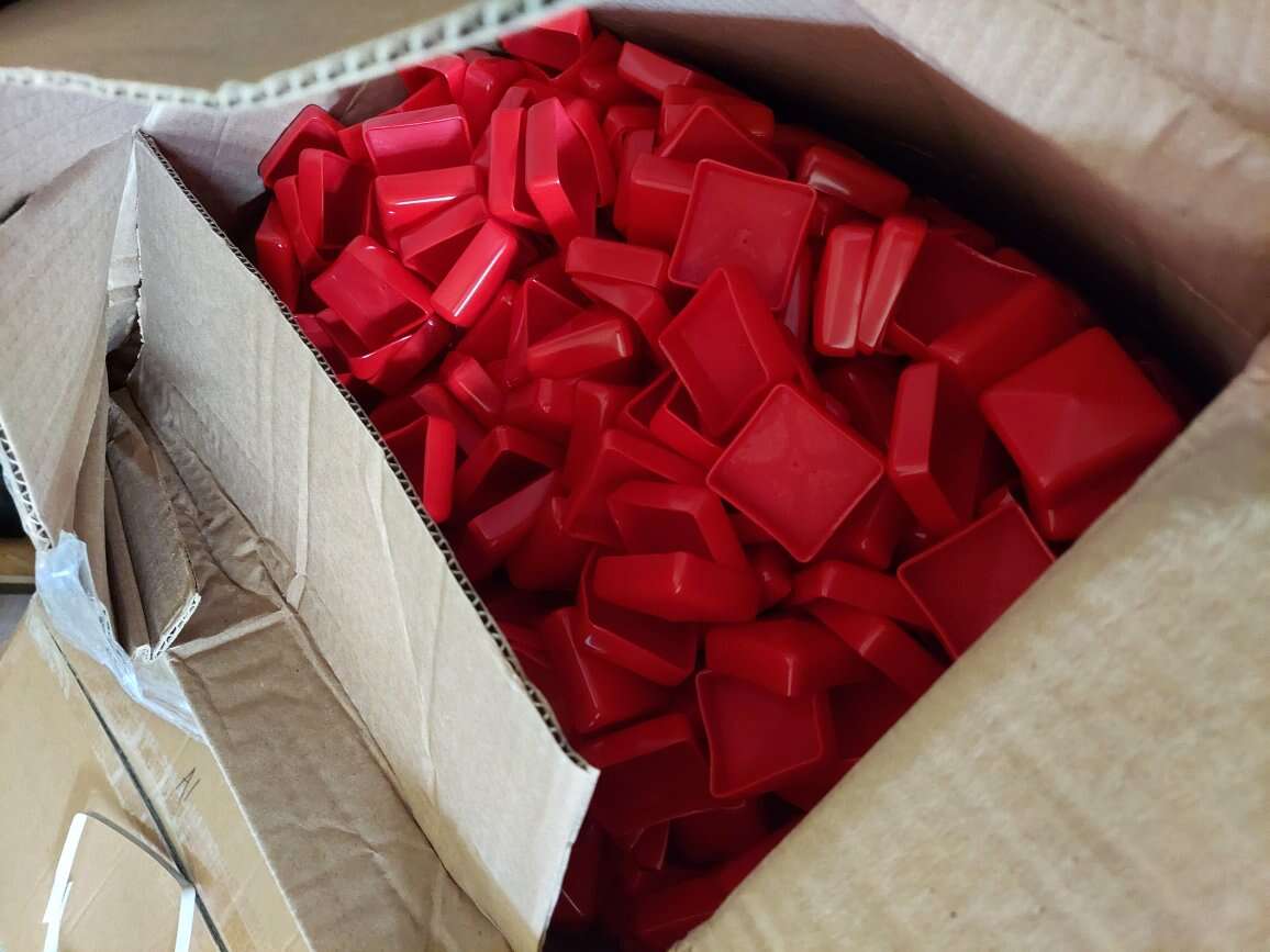 Free Red 2 inch square rubber plugs