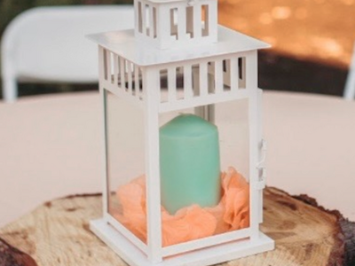 White hurricane lanterns $2 each for 3 day rental