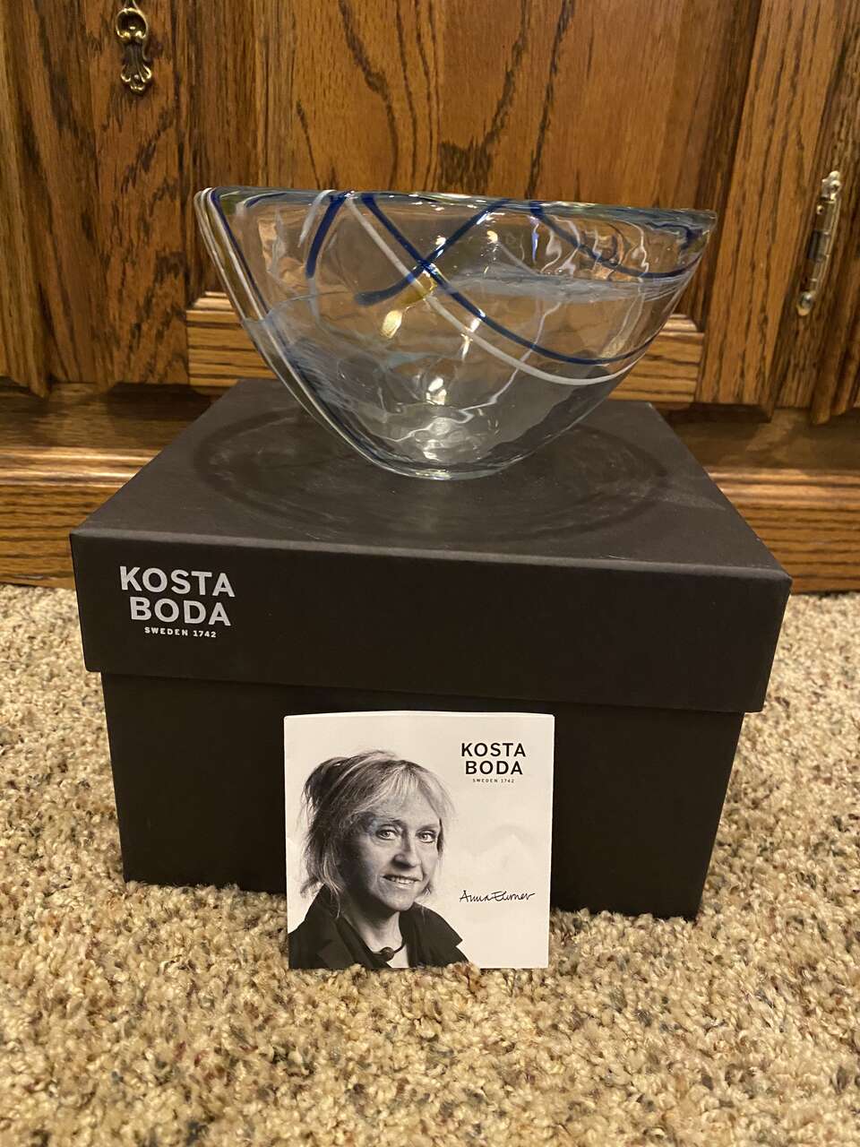 Kosta Boda Bowl. Anna Ehrner White Blue and Black Swirl. Size 6 1/4. New in Box.