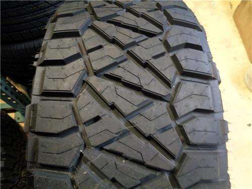 4 NITTO RIDGE GRAPPLER LT 37 13.5 24 124Q LRF 12PLY HYBRID MUD/ ALL TERRAIN TIRES217580