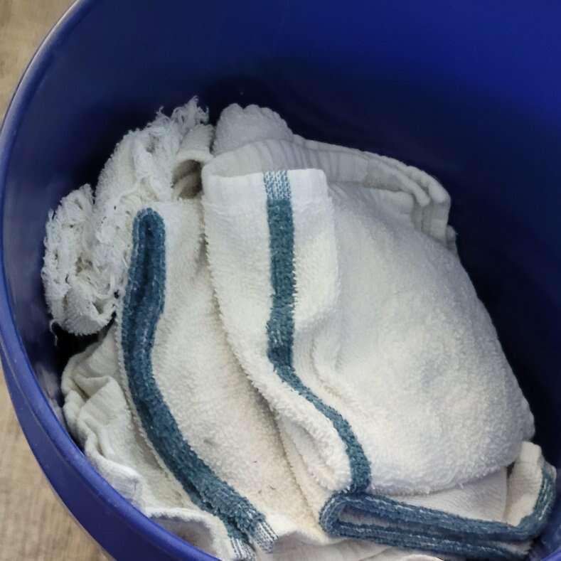 Clean rags in a bucket