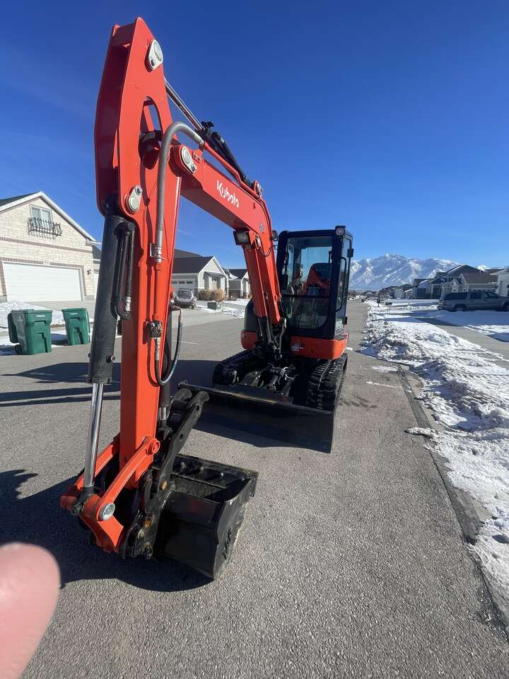 Cabbed Mini excavator $350 A Day W Trailer 6 way blade!