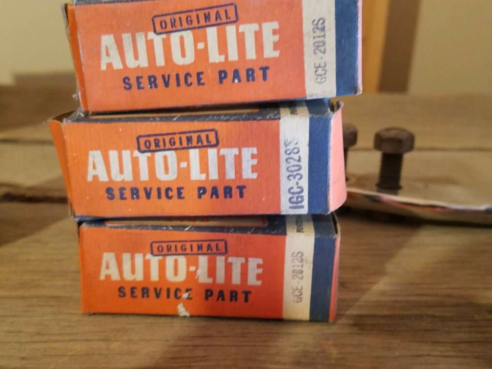 Vintage autolite boxes, some with contents
