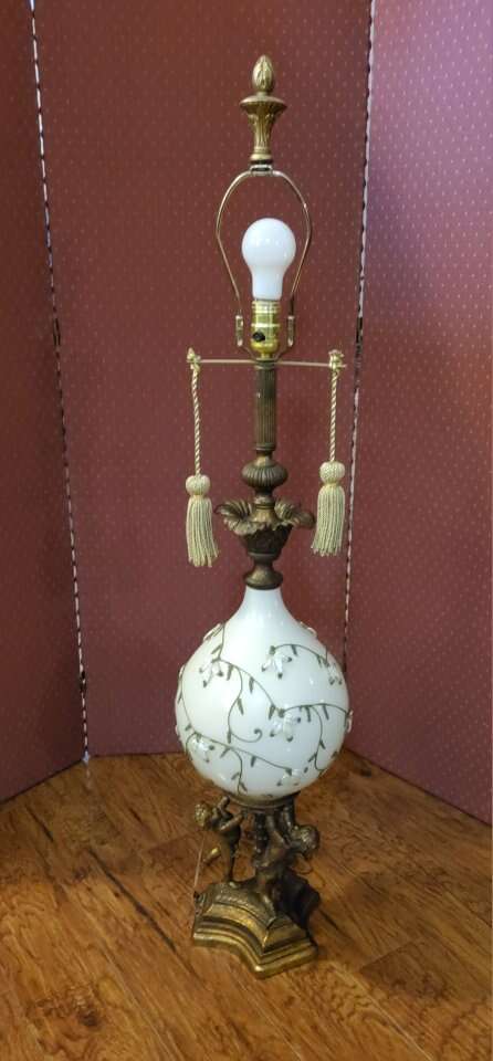 Over the top Hollywood Regency Lamp. Cherub base.