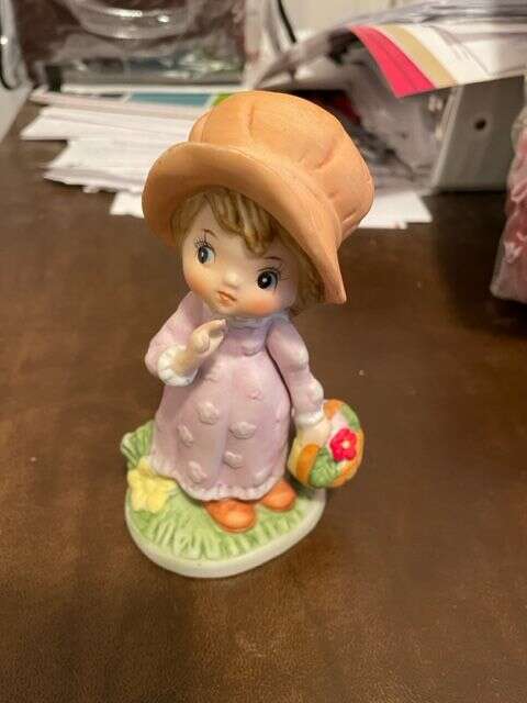 Girl with Basket of flowers figurine