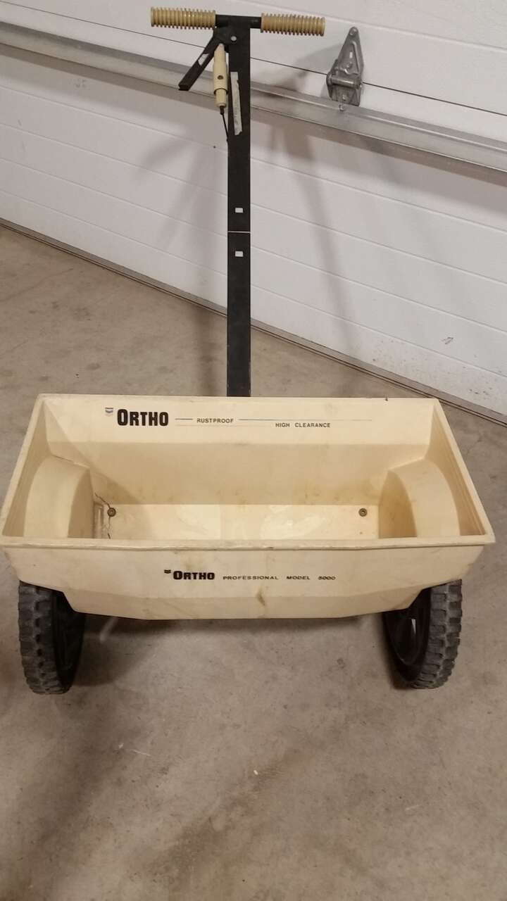 ORTHO drop-style fertilizer spreader.