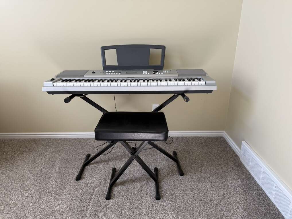 Yamaha portable Grand Piano DGX–230