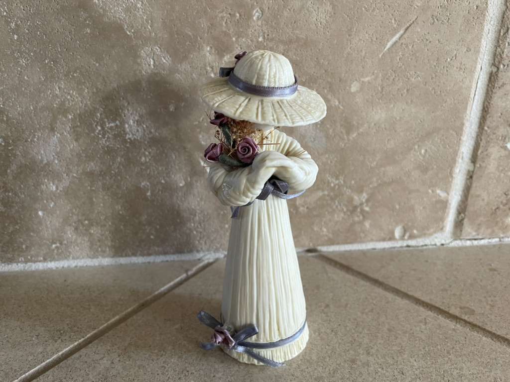 Small Ceramic Girl W/ Purple Ribbons & Flowers