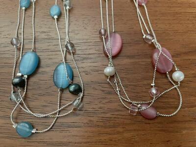 2 Necklaces That Are Each 3 Silver Strands