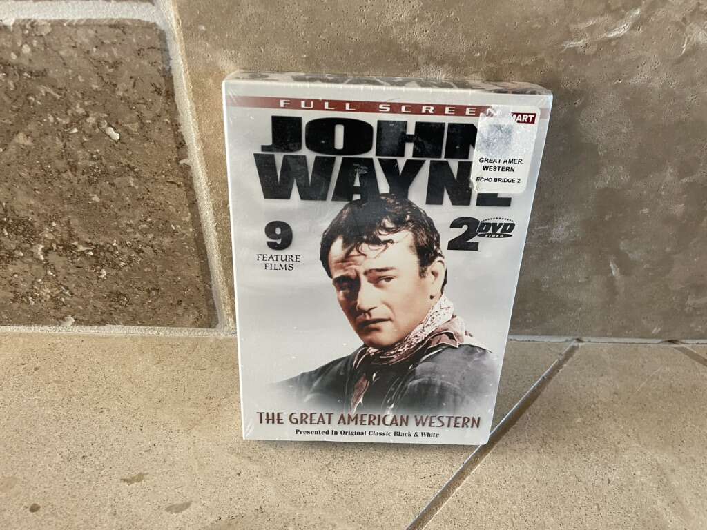 New Unopened DVDs W/ 9 John Wayne Movies