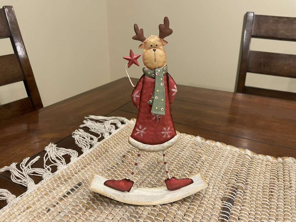 Metal Reindeer In A Dress On A Rocker
