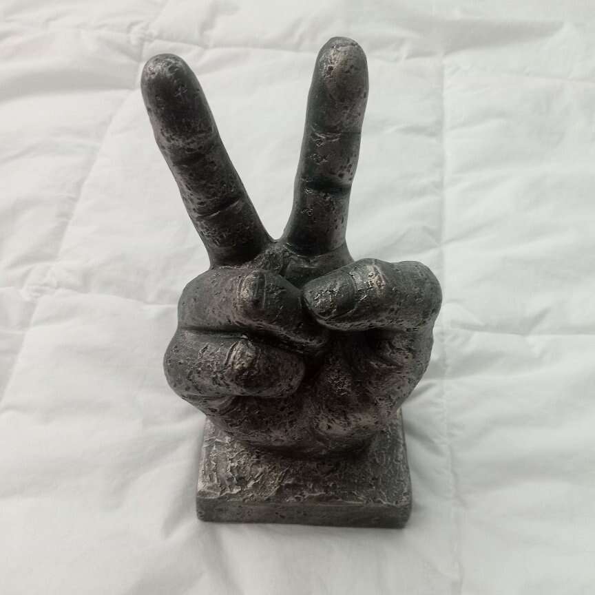 Peace sign statue figurine