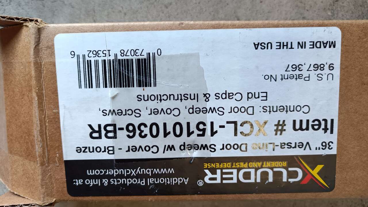 Xcluder 36 in door sweep with cover dark bronze color.