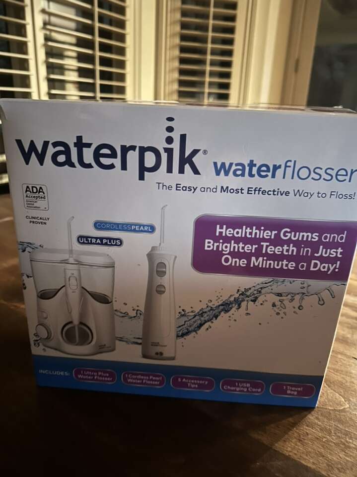 Waterpick/counter Waterflosser (new)