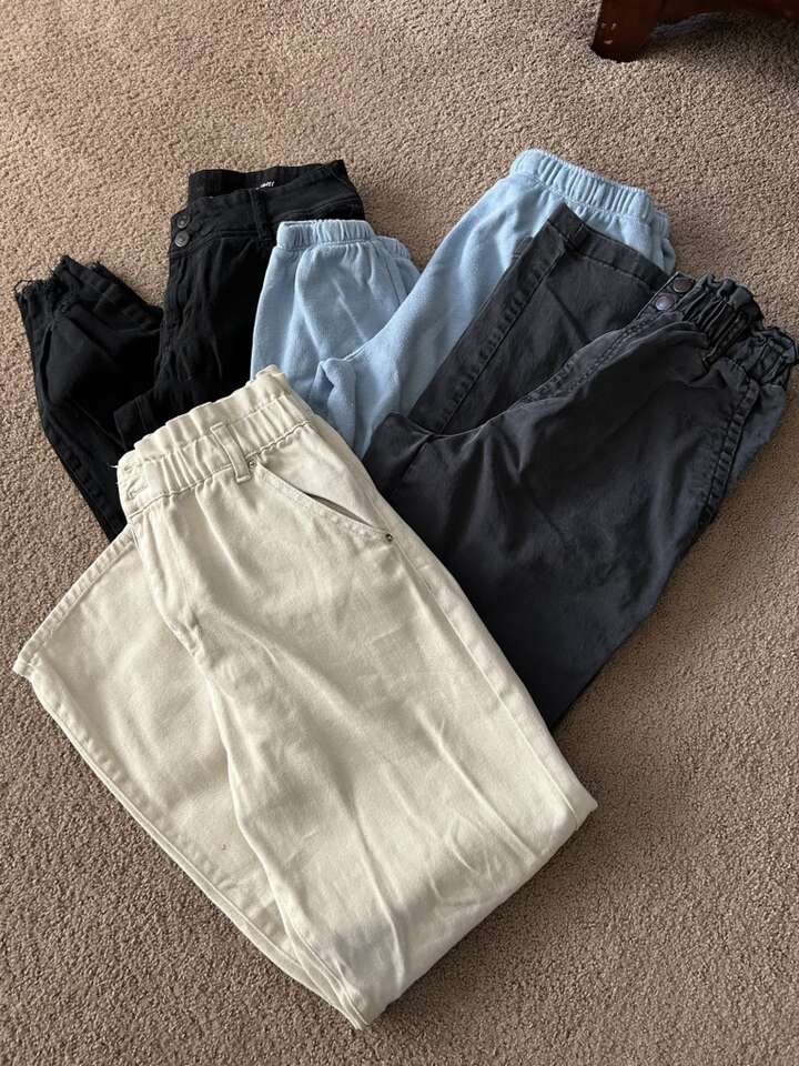 Four Pairs Of Pants Sweats Size M/6