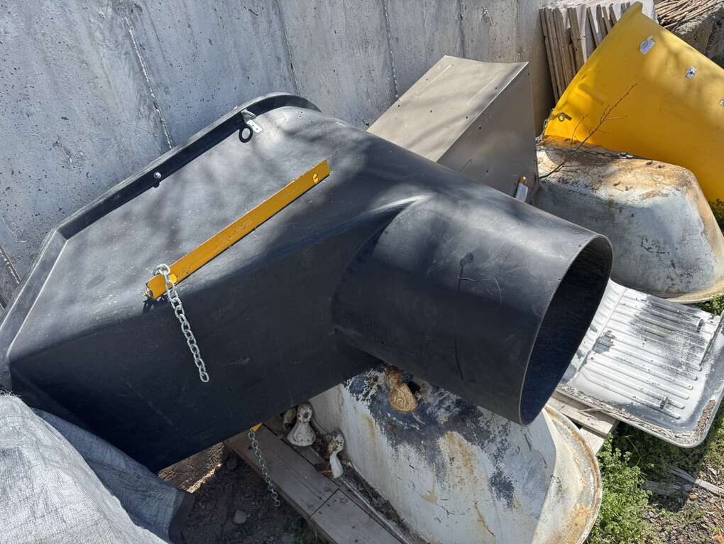Bil-Jax trash chute and hopper with outrigger