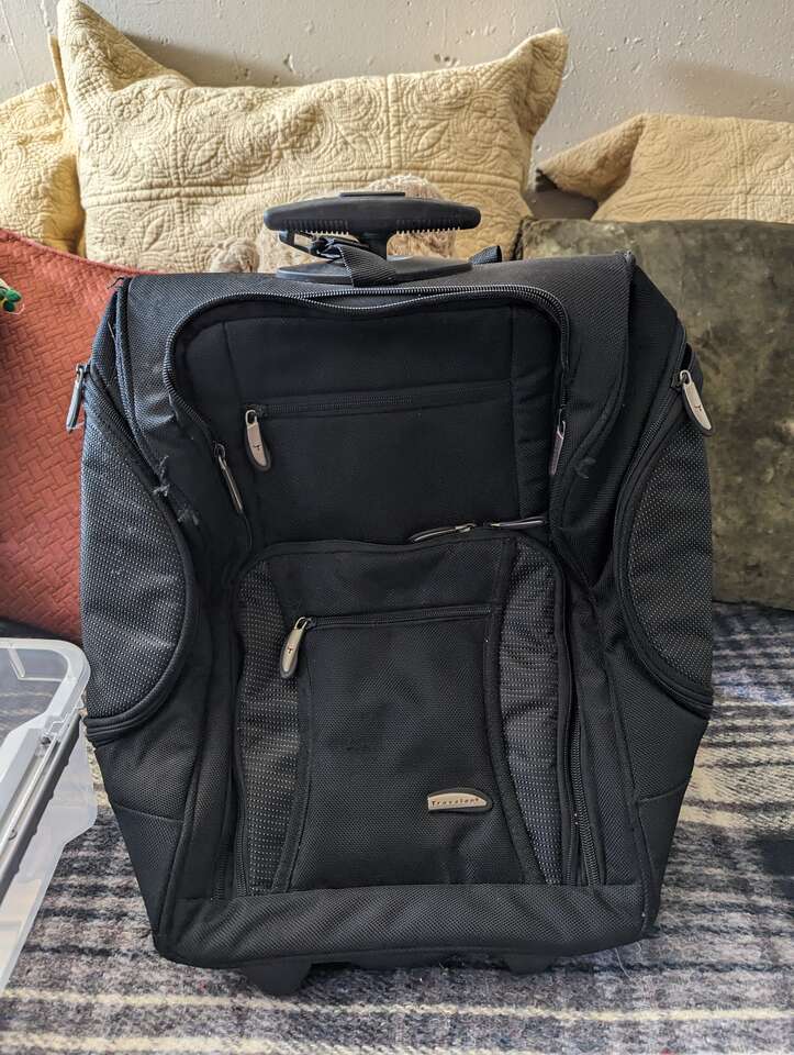 Small rolling carry on bag