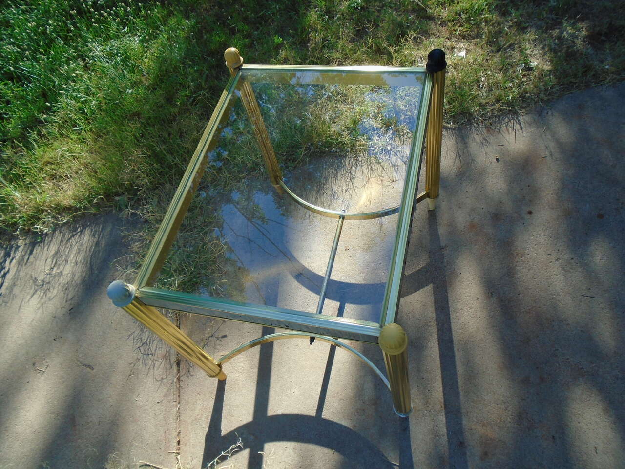 Brass legs glass top coffee table