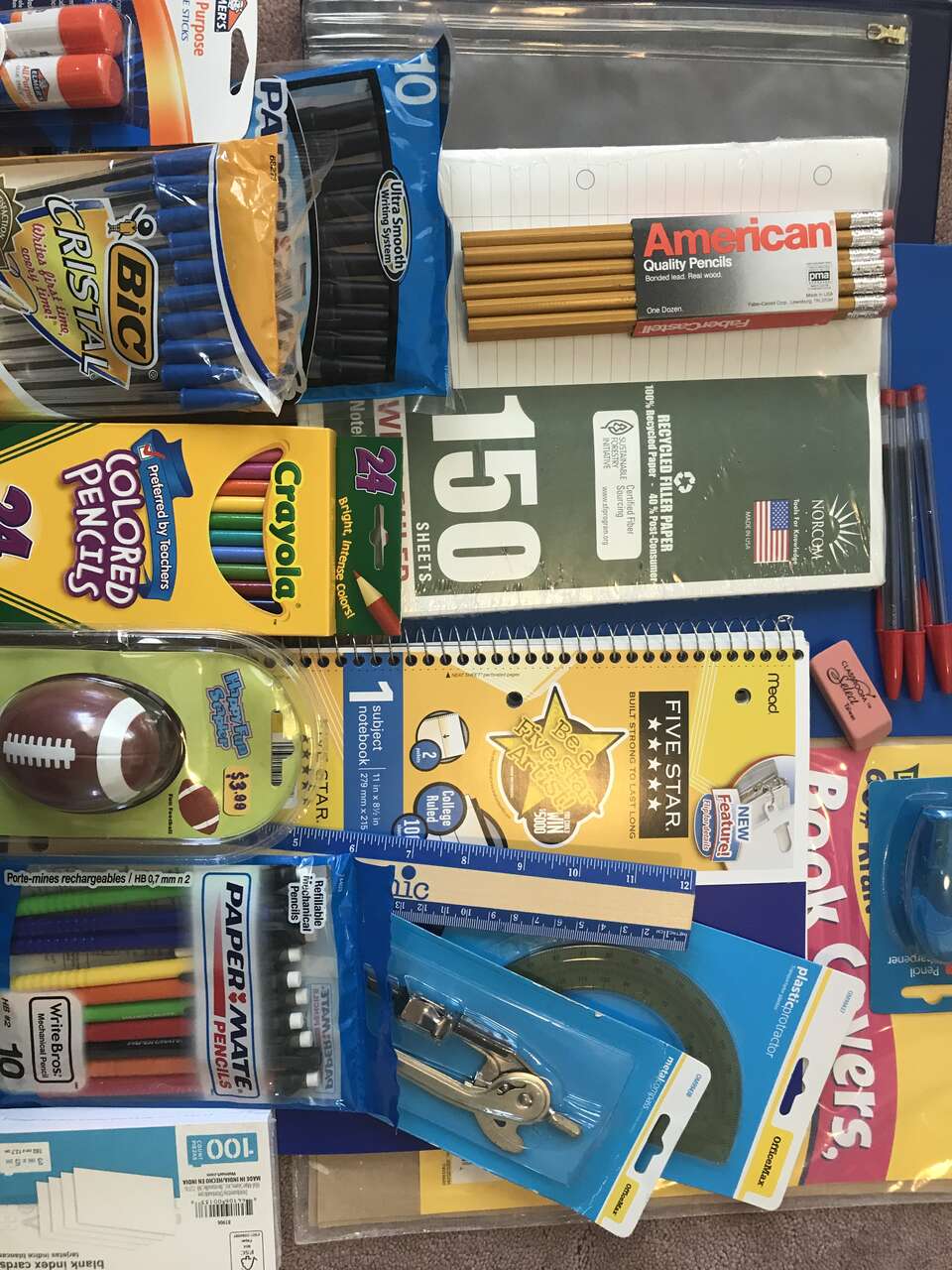 Crayola Colored pencils mechanical pencil bag book cover pens notebook paper football stapler Elmers glue stick