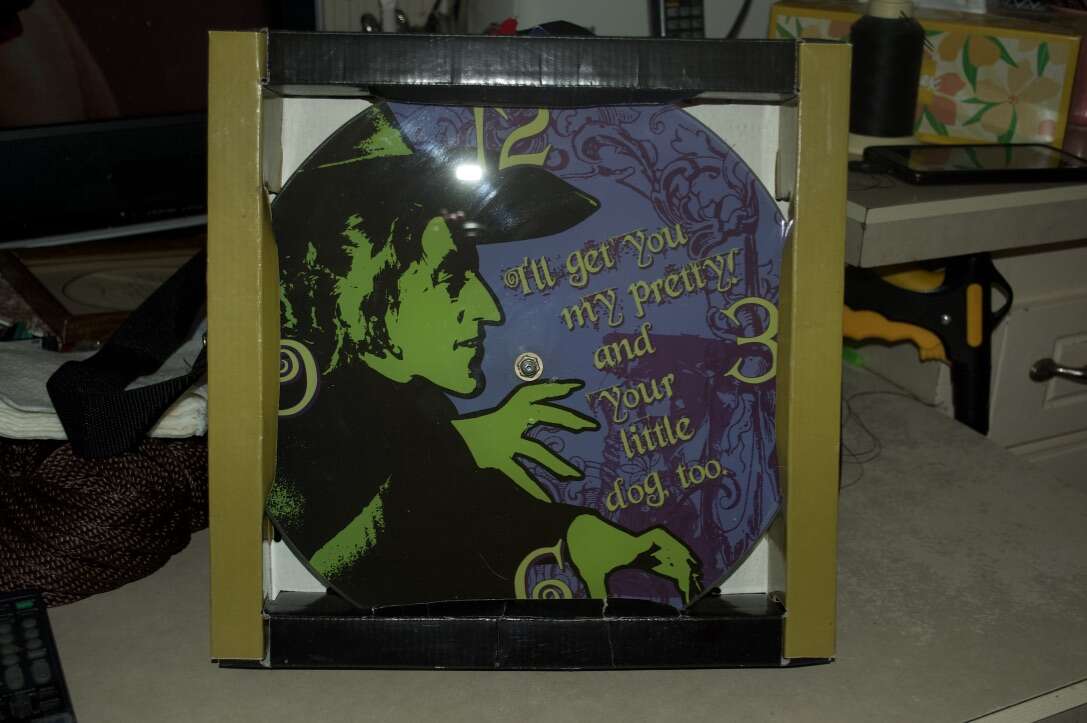 WIZARD OF OZ WALL CLOCK. NEW !