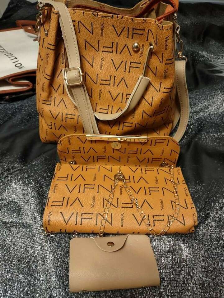 2 purses and a wallet