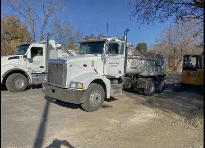 Dump Truck Rentals | Excavation | Gravel Delivery | Road Salt Delivery | Top Soil Delivery