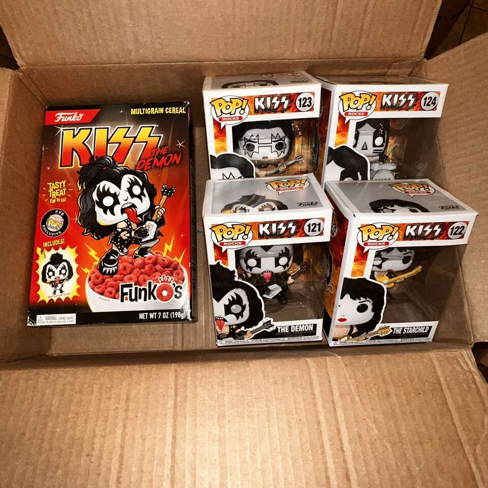 4 KISS Funko Pops and KISS The Demon Multigrain Cereal Box