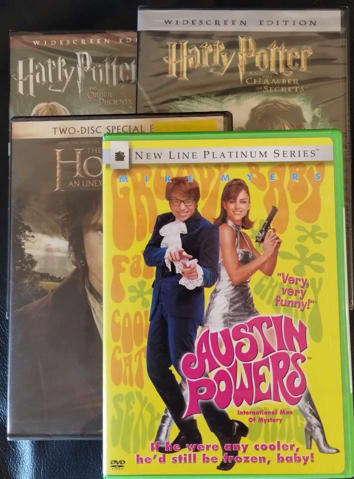 4 DVD'S...Harry Potter: Phoenix; Secrets; Austin Powers, Man of Mystery, The Hobbit. New in shrink wrap.