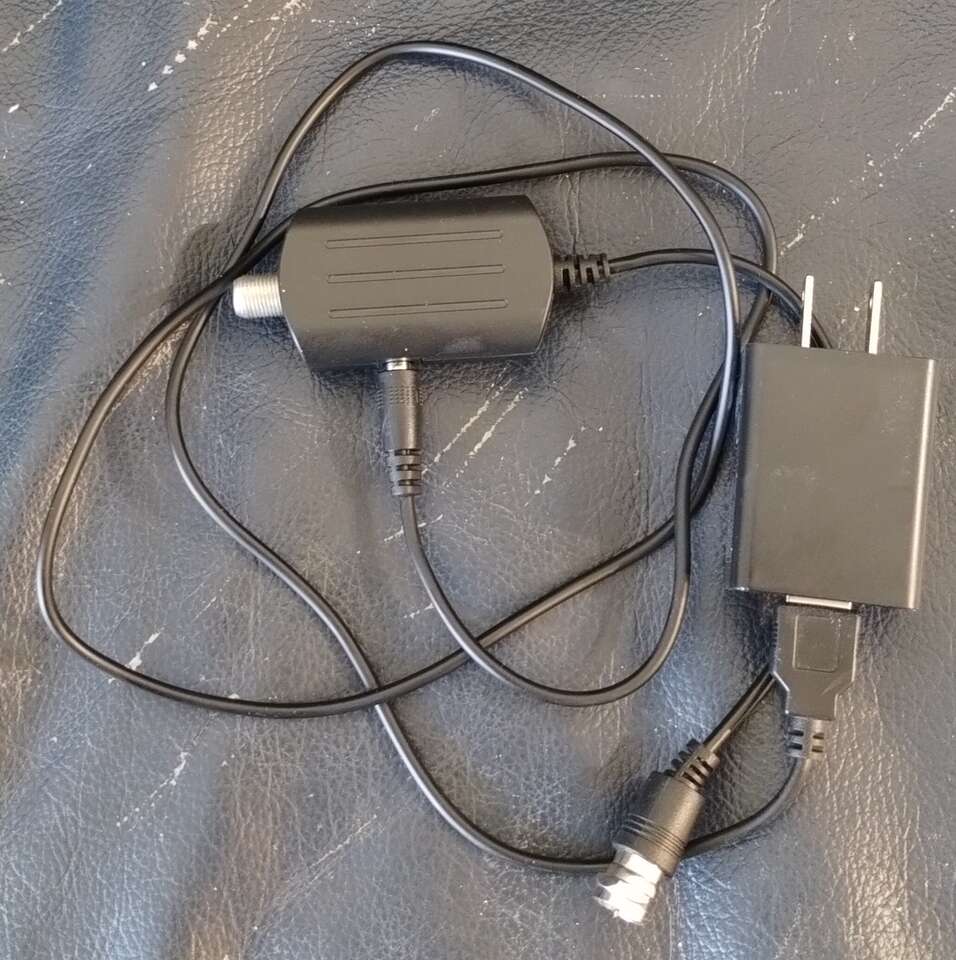 T.V. Coaxial cable and splitter. Pre-owned but new.