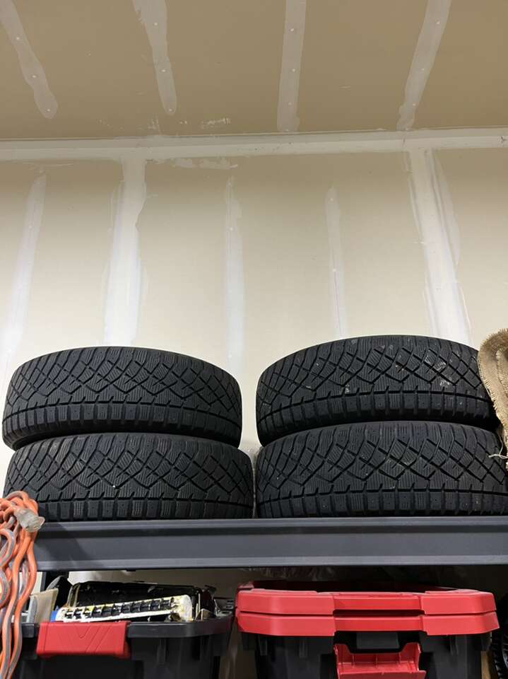 Complete Set Of Tires Mounted On Wheels