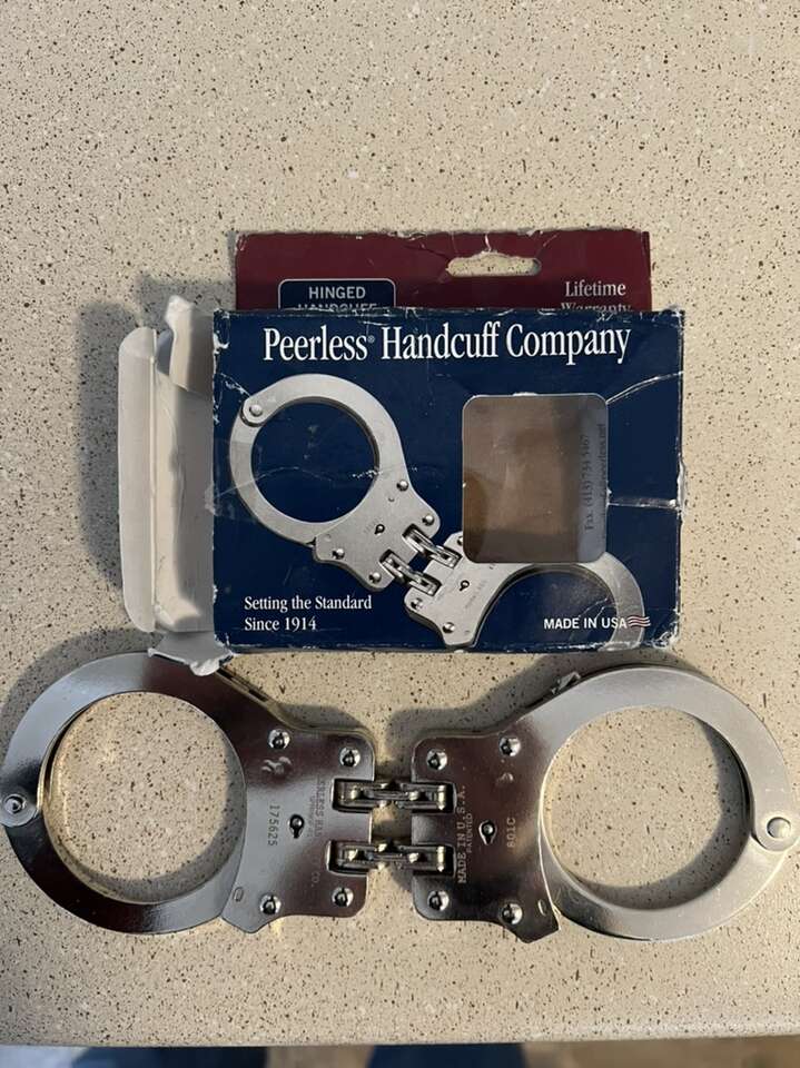 Brand New Hinged Peerless Handcuffs General