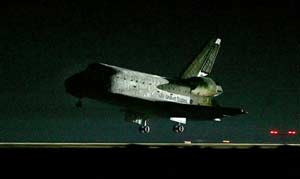 The Space Shuttle Discovery lands at Edwards Air force Base in Calif., on Tuesday, Aug. 9, 2005. (AP Photo/Chris Carlson)