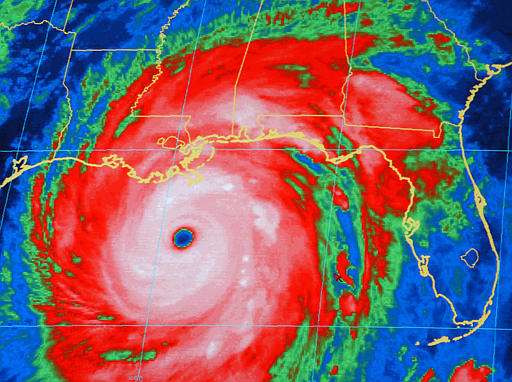 A National Oceanic and Atmospheric Administration infrared satellite images shows the outer bands of Hurricane Katrina, well ashore on the northern Gulf coast and the center of the storm about 165 miles, south-southeast of New Orleans at 8:15 p.m. CT Sunday, Aug. 28, 2005. (AP Photo/NOAA)