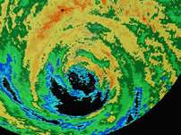 This image from the National Oceanic and Atmospheric Administration, National Weather Service color-enhanced radar shows the center of Hurricane Katrina making landfall in Plaquemines Parrish, La., just south of Buras at about 7:10 a.m., EDT Monday, Aug. 29, 2005.