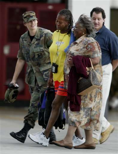 Survivors of hurricane Katrina arrive from New Orleans Saturday, Sept. 3, 2005, in Salt Lake City. (AP Photo/Steve C. Wilson)