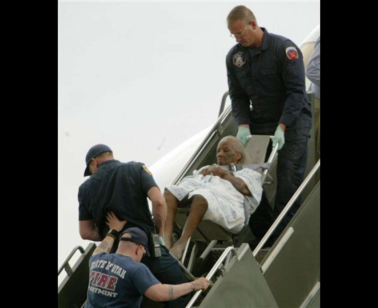 A survivor of hurricane Katrina arrives from New Orleans Saturday, Sept. 3, 2005, in Salt Lake City. (AP Photo/Steve C. Wilson)