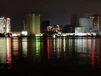Some lights are on in the city of New Orleans as shown in this night photo made late Tuesday, Sept. 6, 2005. Power is slowly being restored to the area still besieged by flood water. New Orleans officials said Tuesday that they would begin to force people to leave their homes.