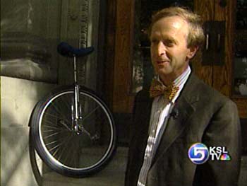 Man Rides Unicycle to/from Work