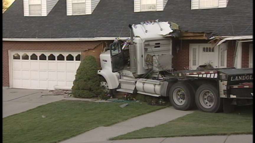 Truck Rolls Into House in Bountiful