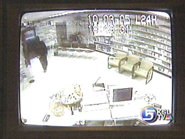 Surveillance video shows pharmacy robber