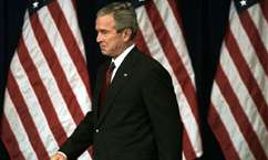 President Bush arrives to speak about war on terror to the National Endowment for Democracy, Thursday,Oct. 6, 2005, in the Ronald Reagan Building in Washington.