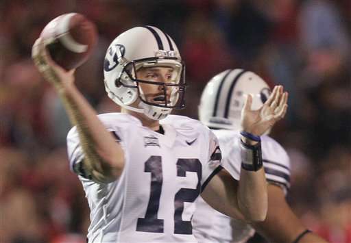 Brigham Young's John Beck passes in the third quarter against New Mexico in Albuquerque, N.M., Saturday, Oct. 8, 2005. BYU won 27-24. (AP Photo/Jake Schoellkopf)