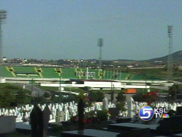 The Olympic Stadium Surrounded by Gravestones