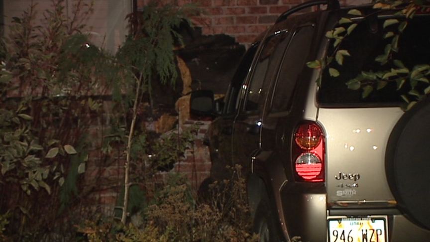 Out of Control SUV Slams Into Wall