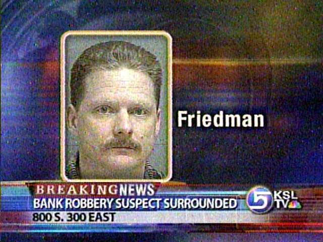 Robbery Suspect Not Found in Surrounded Home